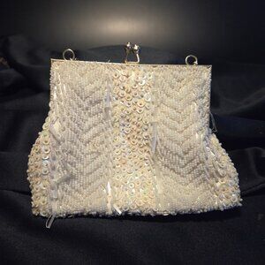 hand stitch clutch very old.